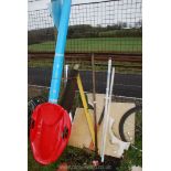 A roll of polythene, sledge hammer, hoe, toboggan etc.