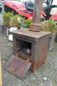 A homemade metal wood burning stove