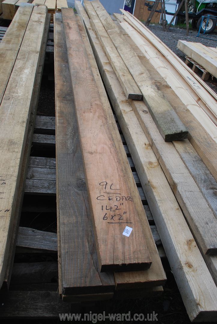 Nine lengths of Cedar wood 6'' x 2'' x 142'',