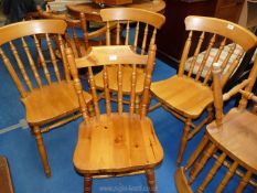 A set of four pine kitchen chairs and two similar.