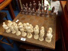 A wood effect chess board and classical themed pieces, a/f.