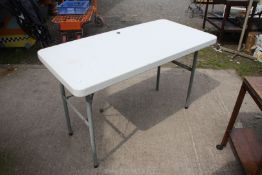 A fold up table, top a/f.