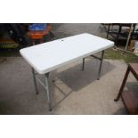 A fold up table, top a/f.