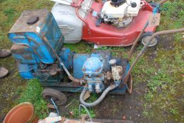 A diesel powered water Pump, (engine turns), Sykes engine services, (no starting handle).