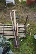 A spade, fork and rake, (children's size).