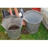 Two galvanised metal pails.