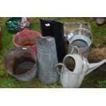 Two metal coal hods, two metal pails and two galvanised watering cans.