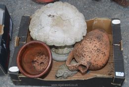 A terracotta Urn, a pixie stool and a glazed pot.