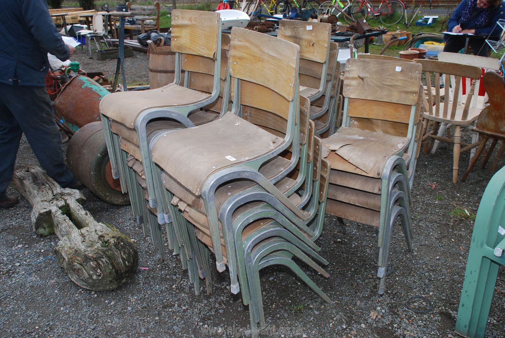 Twenty two aluminium framed stacking school chairs