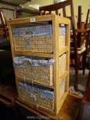 A set of wicker and wood storage baskets, 15 1/2" W x 28 1/4" H.