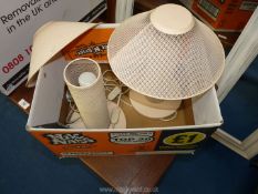 A pair of metal mesh table Lamps with coolie shades.