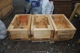 Three wooden planters 23'' x 15''.