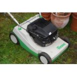 A Viking Briggs & Stratton engine lawn mower, no grass box (running at time of cataloguing).