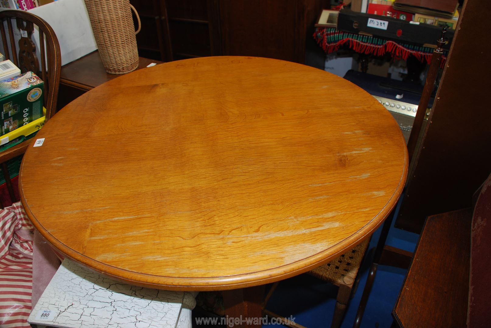 A light wood circular dining table, 39 1/2" W. - Image 2 of 3