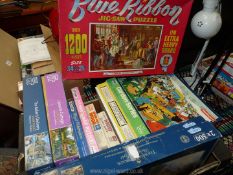 A box of jigsaw puzzles.