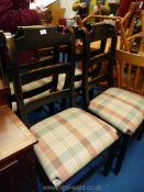 A set of four Dining Chairs with plaid seats (originally purchased from I. & J.L.