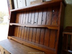 A stained pine dresser back, 47 1/4" W.