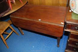 A drop leaf table in dark wood with end drawer, one leg a/f, 42'' square when extended.