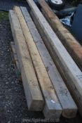 Three lengths of softwood 6'' square x 142'' long.