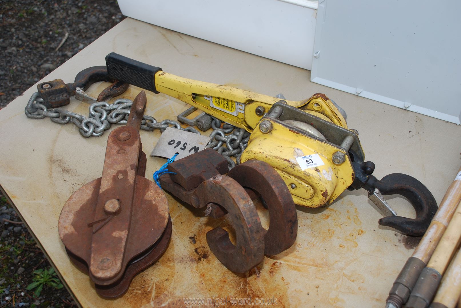 A metal chain ratchet winch, rope pulley, etc.