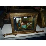 A brass log box with mirrored front depicting a cavaliers playing chess and a brass Spraygen