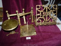 A small quantity of brass including a book stand, miniature table,