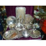 A large quantity of plated ware, trays, wine bottle coaster, coffee pot, money box, cream jugs, etc.