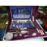 An oak 'Dahlia Cabinet' cutlery box with part canteen of cutlery, Joseph Rodgers carving set,