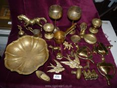 A quantity of brass items including door knockers, animals, heavy dish etc.