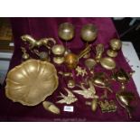 A quantity of brass items including door knockers, animals, heavy dish etc.