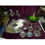 A quantity of plated items including candelabra, jug, tray,