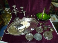 A quantity of plated items including candelabra, jug, tray,