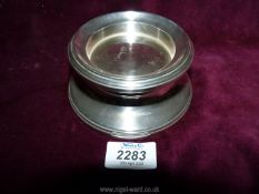 A round silver stand hallmarked 925 Birmingham 2000, maker B & Co., 4 3/4" diameter.