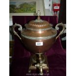 A Copper and brass Samovar, 19" tall with scrolled fish shape handles, (tap handle missing).