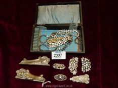 A quantity of vintage diamante jewellery including necklaces, bracelets, belt buckle, brooch, etc.