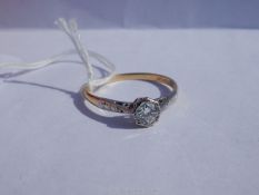 An 18ct gold and platinum Diamond Ring, 1/2 carat approx, with hallmarks, size R 1/2.