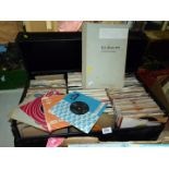 A large hardboard case containing a large quantity of 7'' singles and EP's including Small Faces,