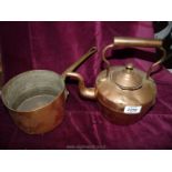 A copper pan by Leon Jaeger & Sons and a kettle (a/f).