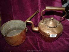 A copper pan by Leon Jaeger & Sons and a kettle (a/f).