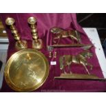 A small quantity of brass including horse ornament, tray and pair of candlesticks.