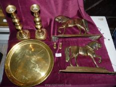 A small quantity of brass including horse ornament, tray and pair of candlesticks.