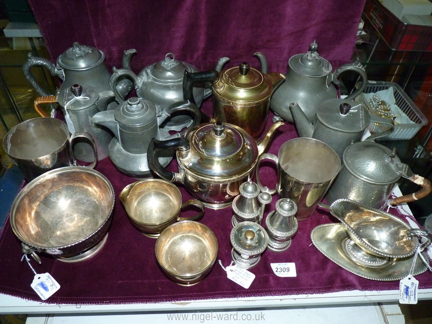 A quantity of Pewter Teapots including some with hammered finish, some a/f.
