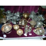 A quantity of Pewter Teapots including some with hammered finish, some a/f.
