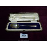 A cased Silver Spoon, Sheffield 1910, makers Joseph Rodgers & Sons, 35gms.