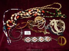 A small quantity of beaded necklaces and bracelets.