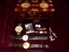 An oriental jewellery box with contents, necklace, charm, four watches including Marc Ecko, Bel Nuo,