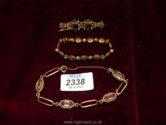 A pretty bracelet set with pale mauve and green stones,