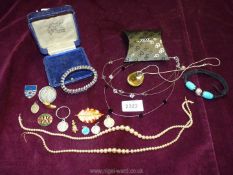 A small quantity of costume jewellery including two small strings of cultured pearls (no clasps),