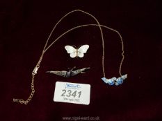 A Sterling Silver and enamel necklace and brooch with rose and bird details plus an enamel