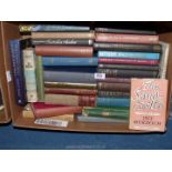 A box of books to include Christopher Columbus, The Sandcastle by Iris Murdoch,